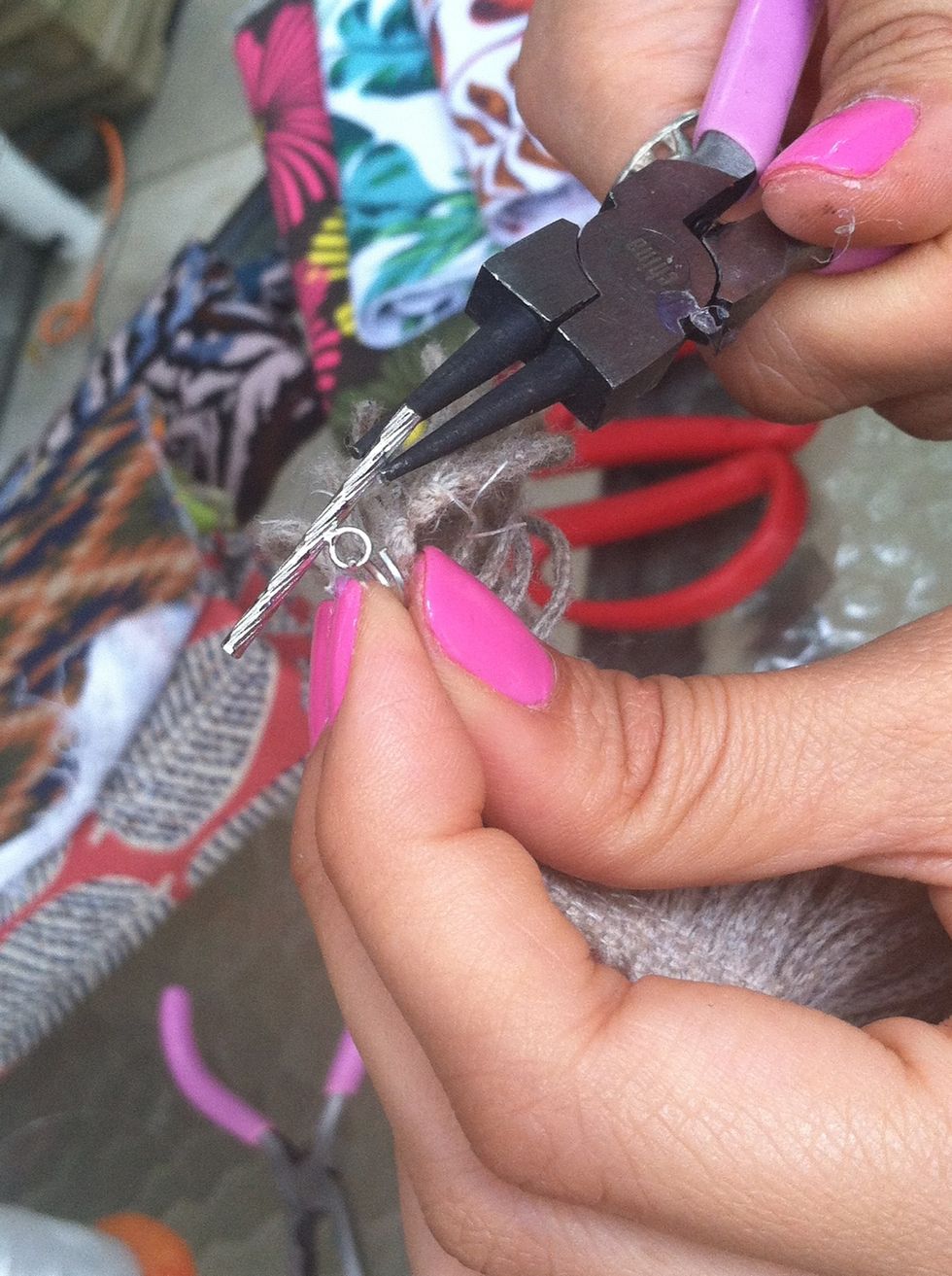 Attach the O-ring and one end of the toggle clasp to one end of the fringe.