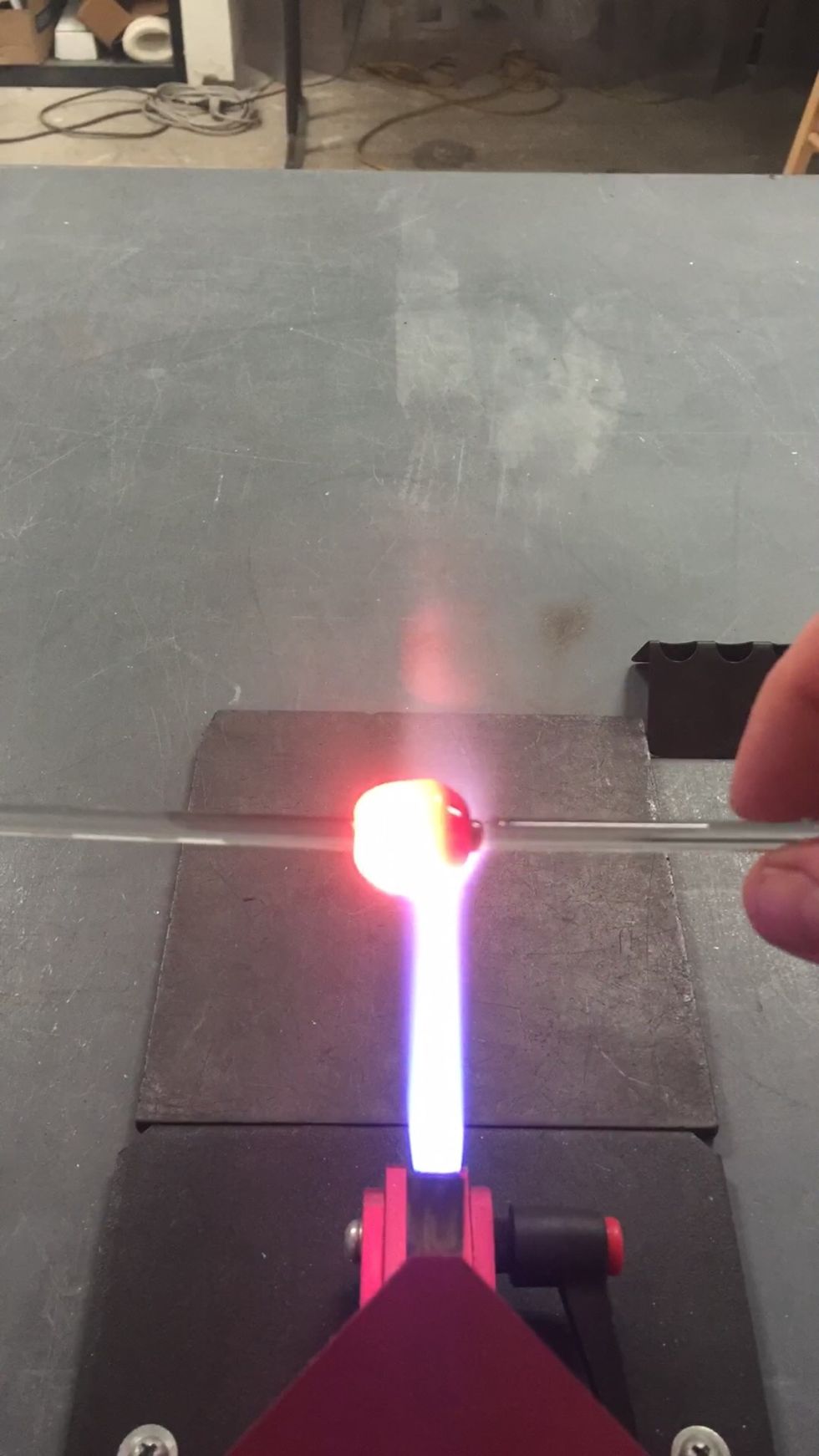 Attach the other clear punty to the end of your Thallo ball so you have two handles to hold.