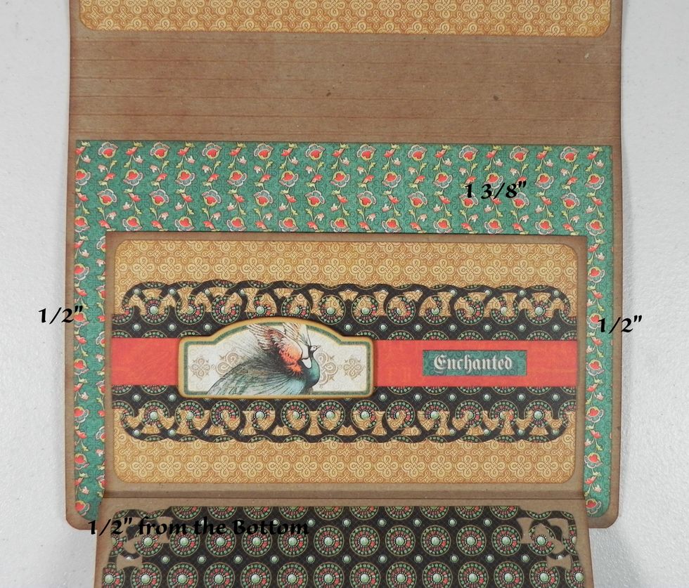 Attach the pages to the album. The last page should be a pocket page. Attach the pocket page 1 3/8" from the bottom score line (at the top) and 1/2" from the sides and bottom.