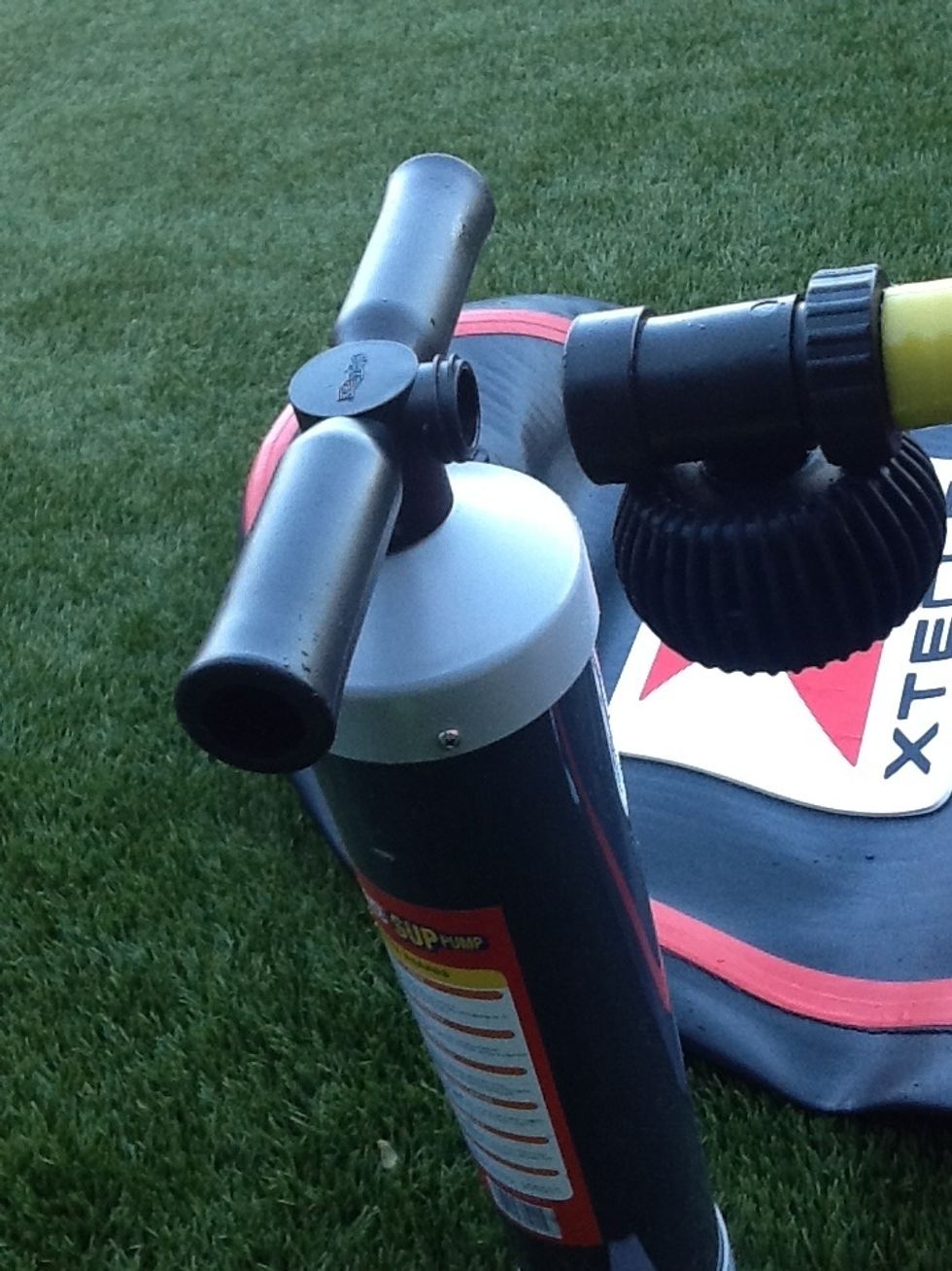 Attach the pressure gauge to the hose, then the other end of the gauge to the pump. Depending on your pump (I'm using a Bravo pump) start the attaching turning clockwise with the gauge facing down.