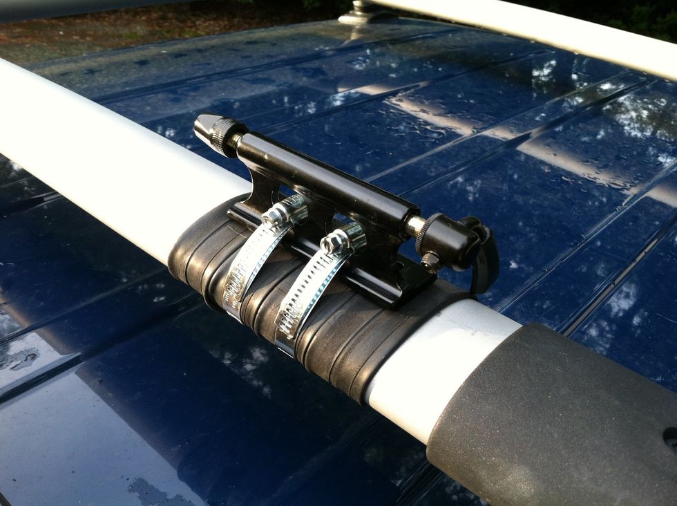 Attach the second hose clamp. Stress out 'cause you're a perfectionist and the clamps aren't identically positioned. Tighten everything up now. But don't gorilla-tighten and cut through the tube.