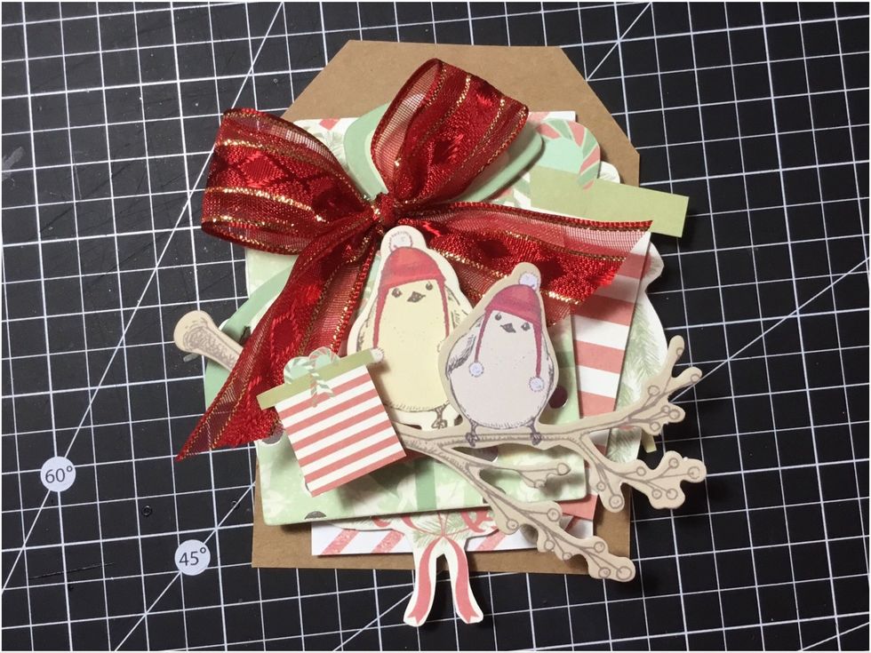 Attach the small fussy cut present, as shown, with 3D dots.