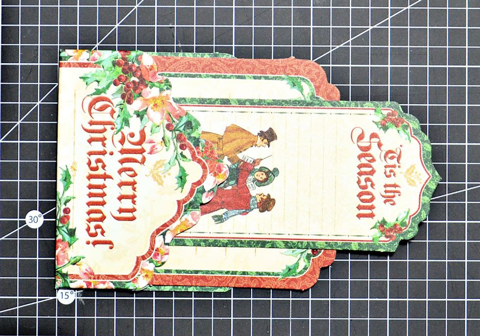 Attach the smaller tag as shown.