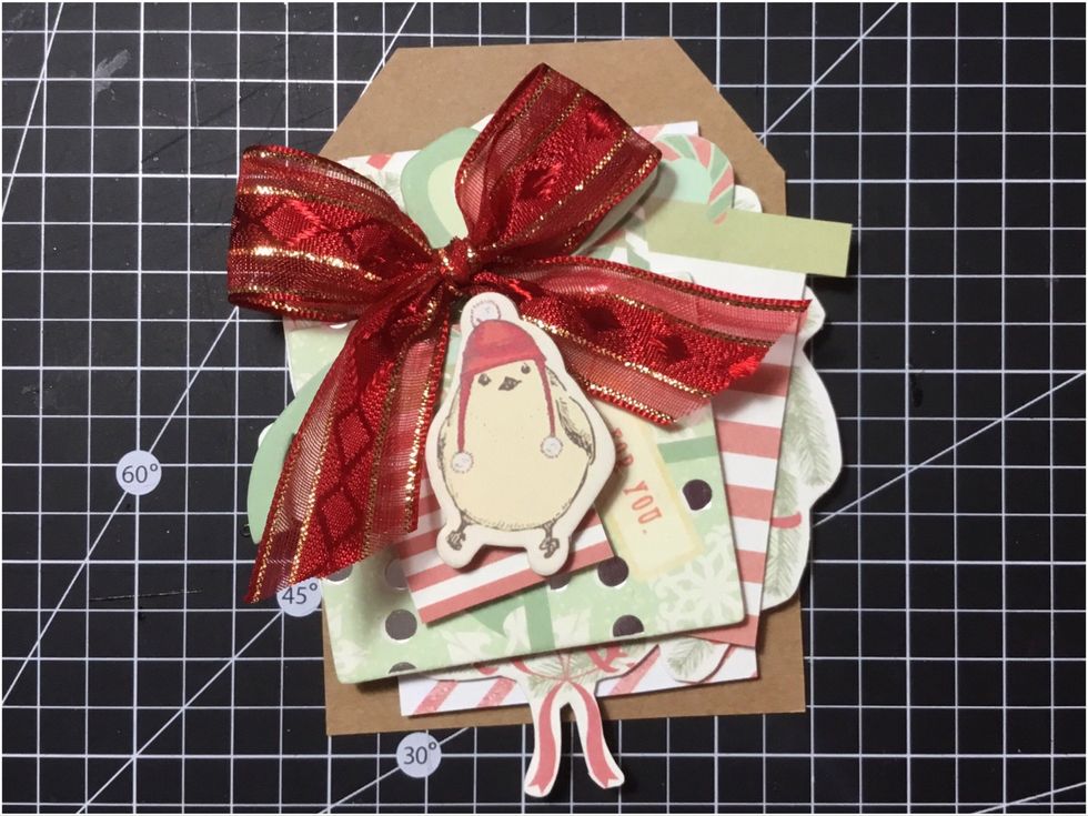 Attach the Sweet Peppermint chipboard large penguin.