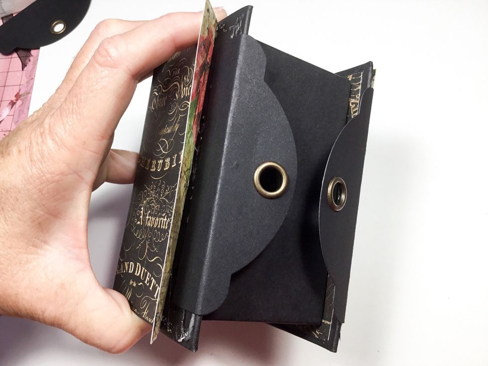 Attach the tag tops to the front and back of the box as shown. Make sure they align perfectly to allow the binder clip to be used to close the box.