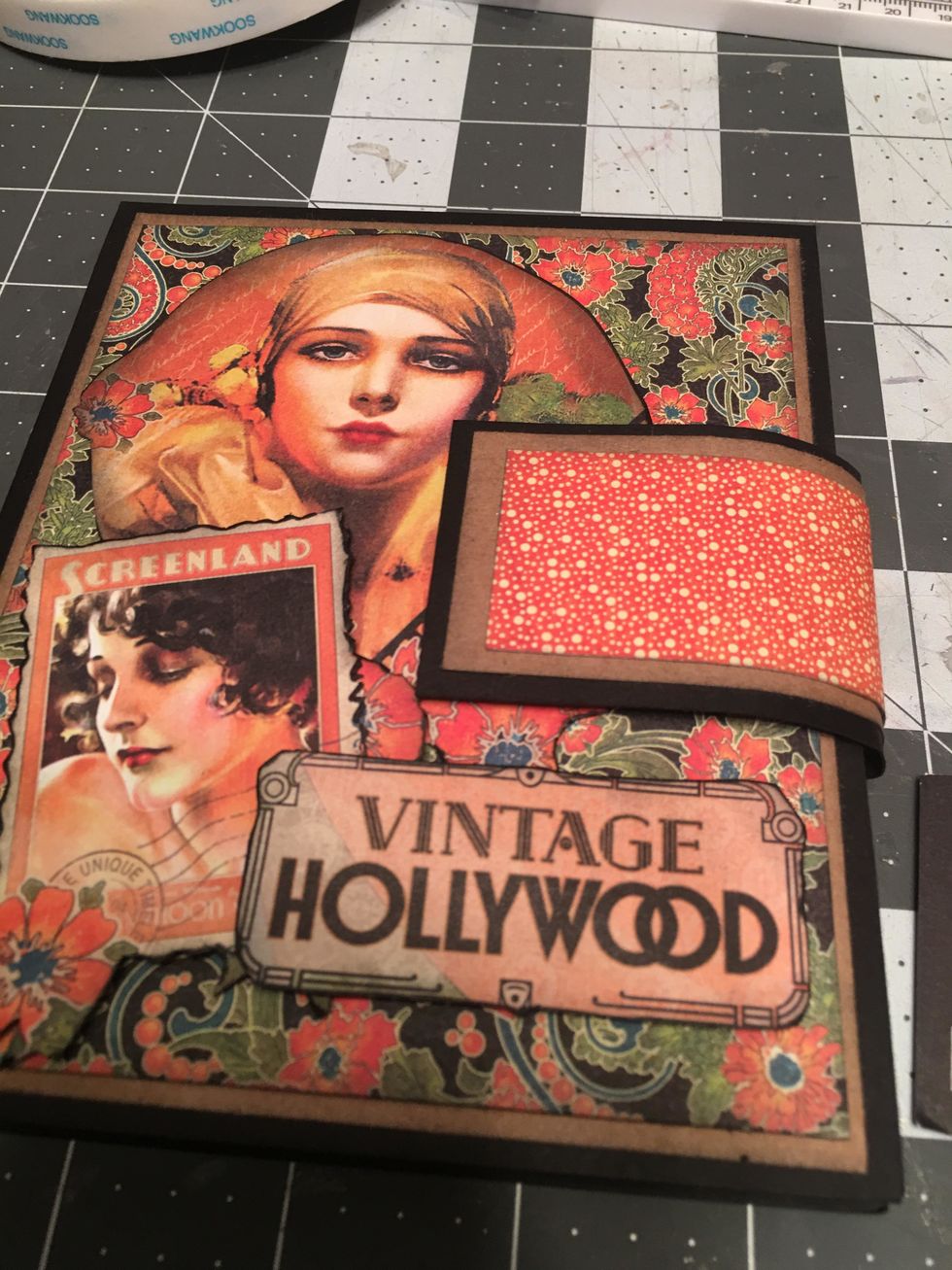 Attach the "Vintage Hollywood" to the front of the album a bit over the stamp image as shown.