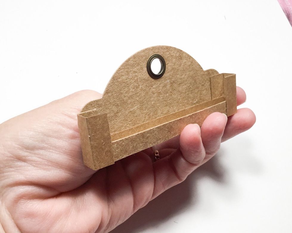 Attach to tag top as shown.