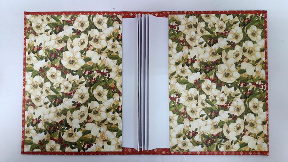 Attach two 4 1/4" x 6" pieces to inside cover.