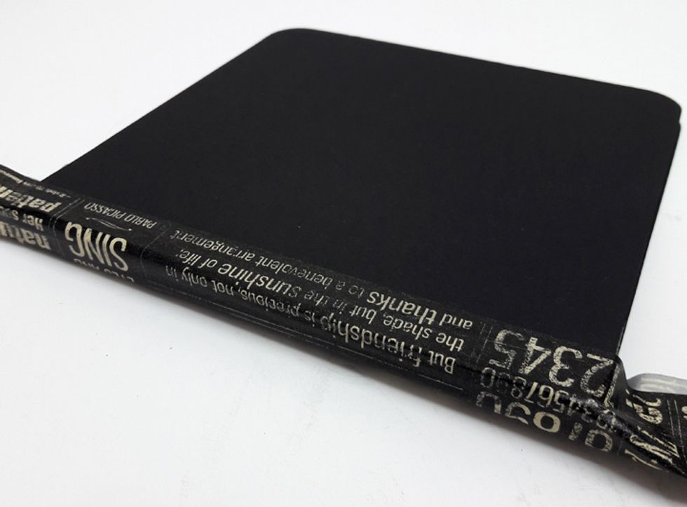 Attach washi tape on spine and back cover. If the mini album is too thick you can use two pieces of washi tape.