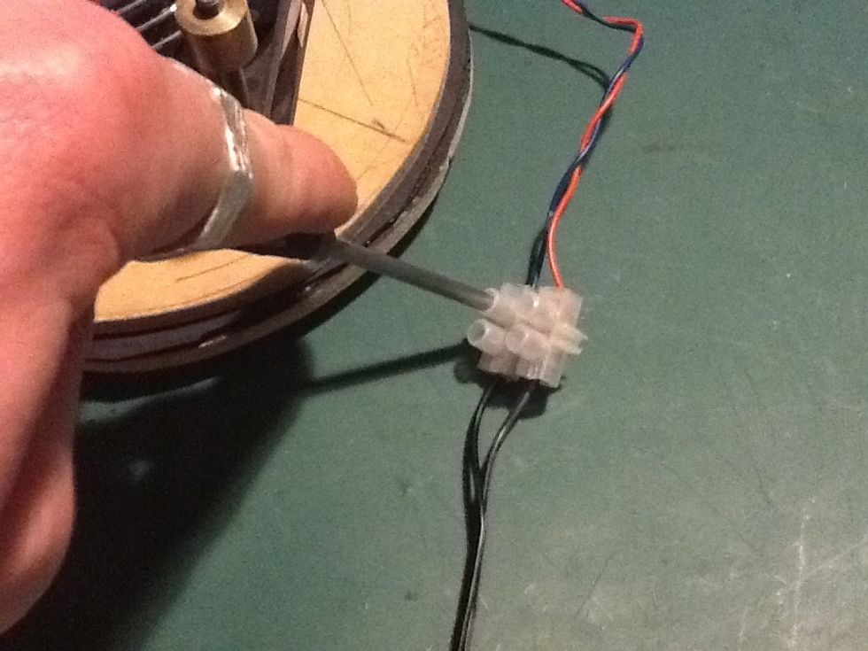 Attach your power transformer using the screw terminals. Ensure that you have the polarity of the fan correct. Make sure the screw are fully tight IMPORTANT - dont use tape to join the cables