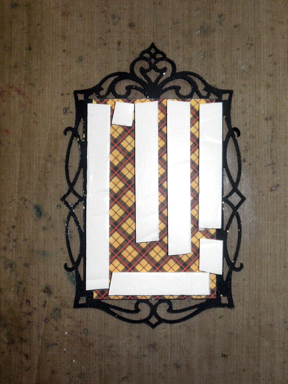 Attache the Creative cut apart to the Sizzix frame and then pop it up with foam tape or cardboard.