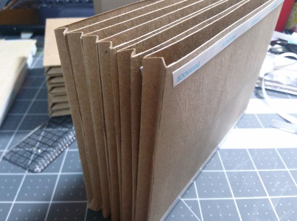 Attache the envelopes together making sure that the bottom is flush.