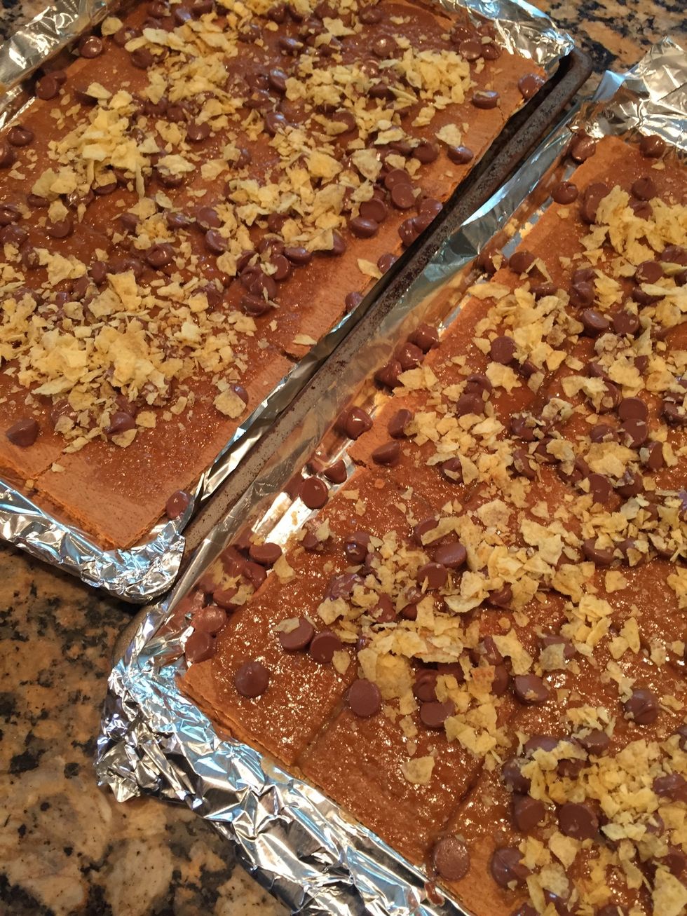 ATTENTION everyone that is ruining chocolate with nuts. Stop that. Instead, we use crushed plain potato chips..sprinkle all over tops of each pan