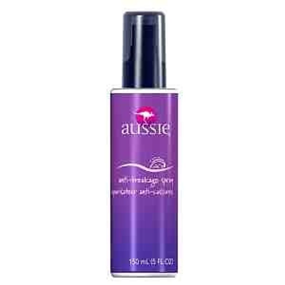 Aussie anti breakage spray. I tease my hair alot and i spray this on right before i brush my hair out so my hair won't break and it takes the tease out with no problems.