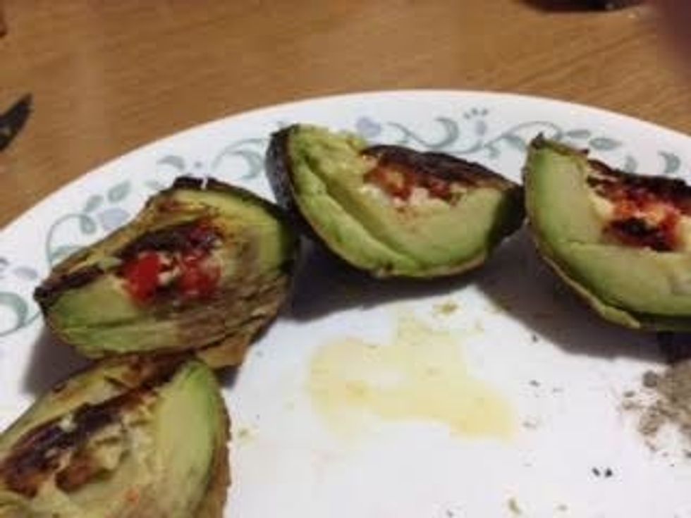 Avocado cut into 4 pieces.