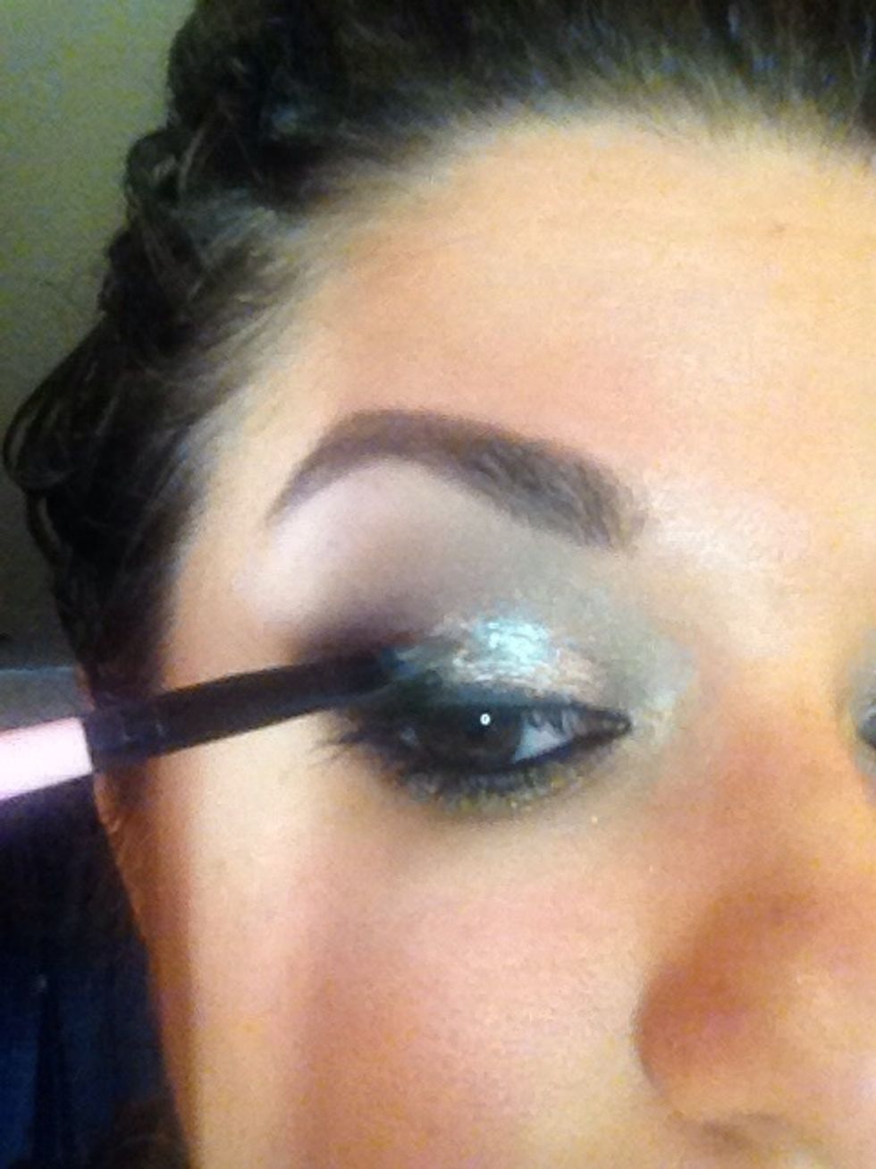 Avoid placing the glitter on liner or dark shadow areas