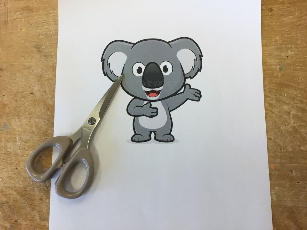 B\u00f6rja med att klippa ut din pappersmall.