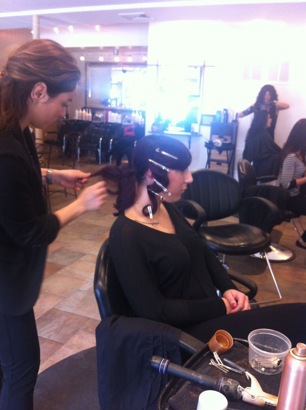 Back comb hair in pony..