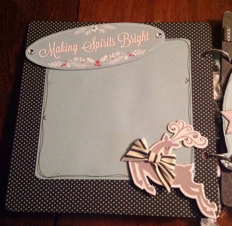 Back of square page. Cover with polka dot paper. Add mat if desired. Add embellishments. I attached ribbon using a glue dot! Don't forget to outline your detail!