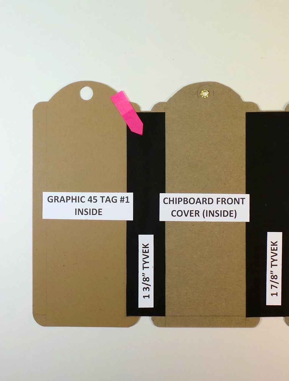 Back on the inside now. The red arrow shows the black Tyvek we just finished adding, and the new paper tag is on the left. Give the Tyvek a good burnish.