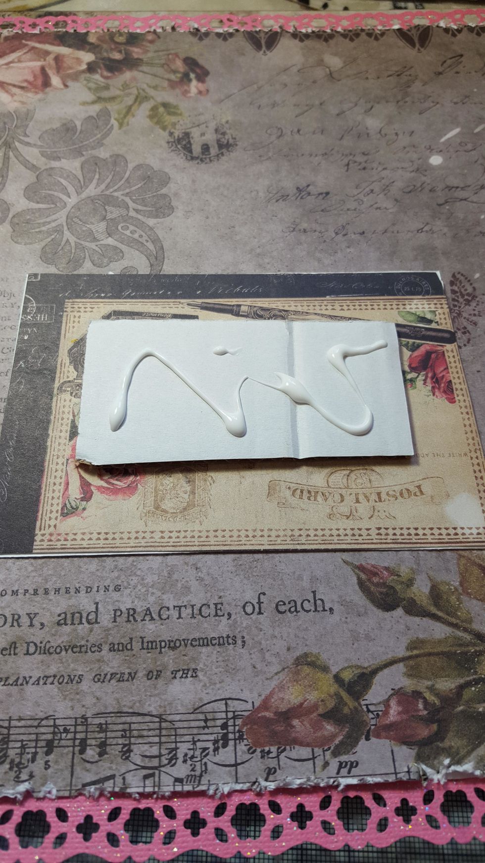 Back your photo with some cardstock ( maybe not a nice piece like I used!) and then using a piece of cardboard to lift up, glue onto the journal cards.