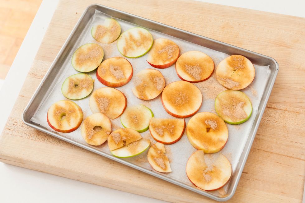 Bake apple slices for 1 hour, then flip them over and bake for another 1 to 1.5 hours.