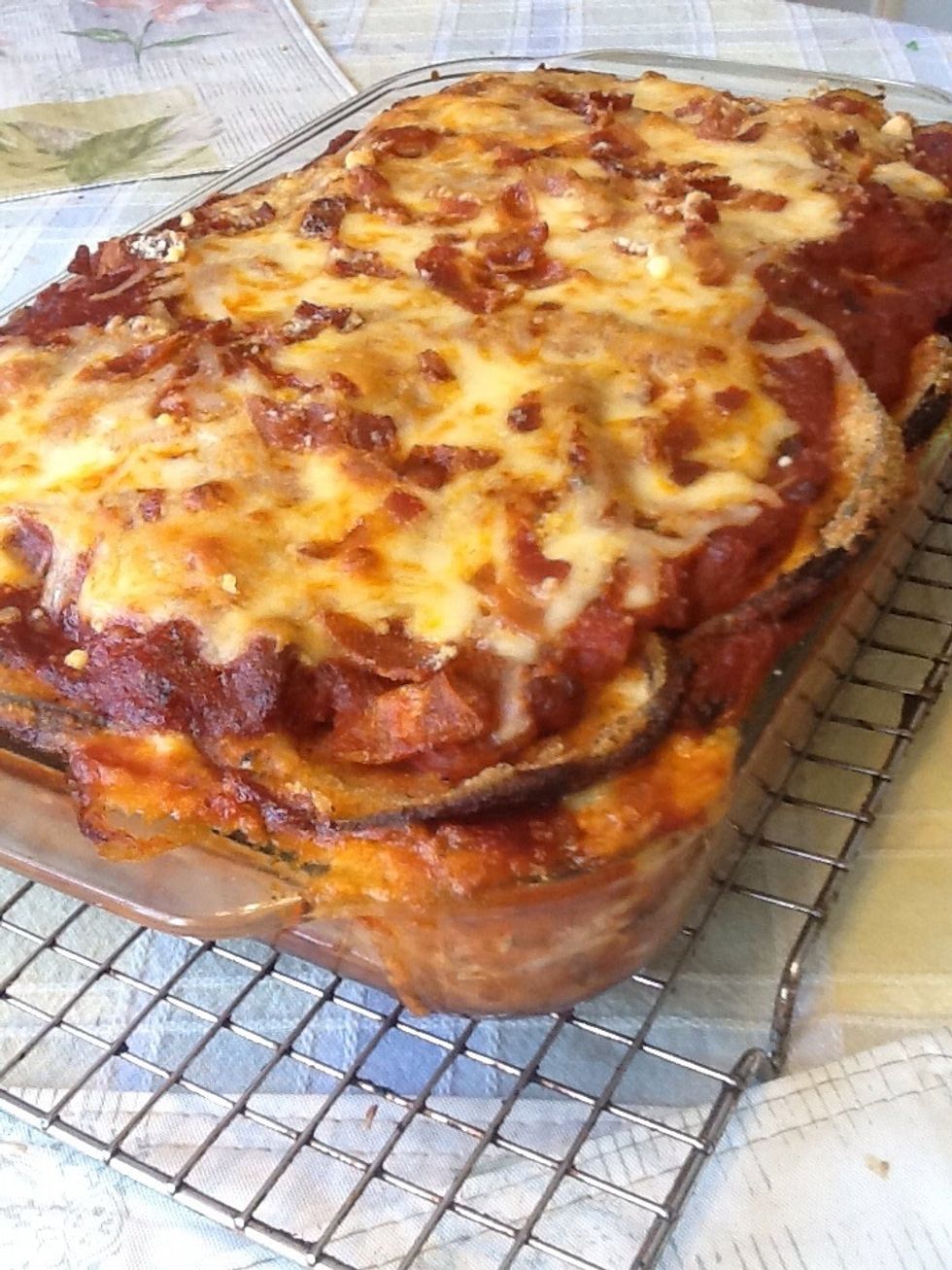 Bake at 350\u00b0 in a preheated oven for 35 min. or until golden brown, give it a moment to cool before serving and Bon apetito! \ud83d\ude0a