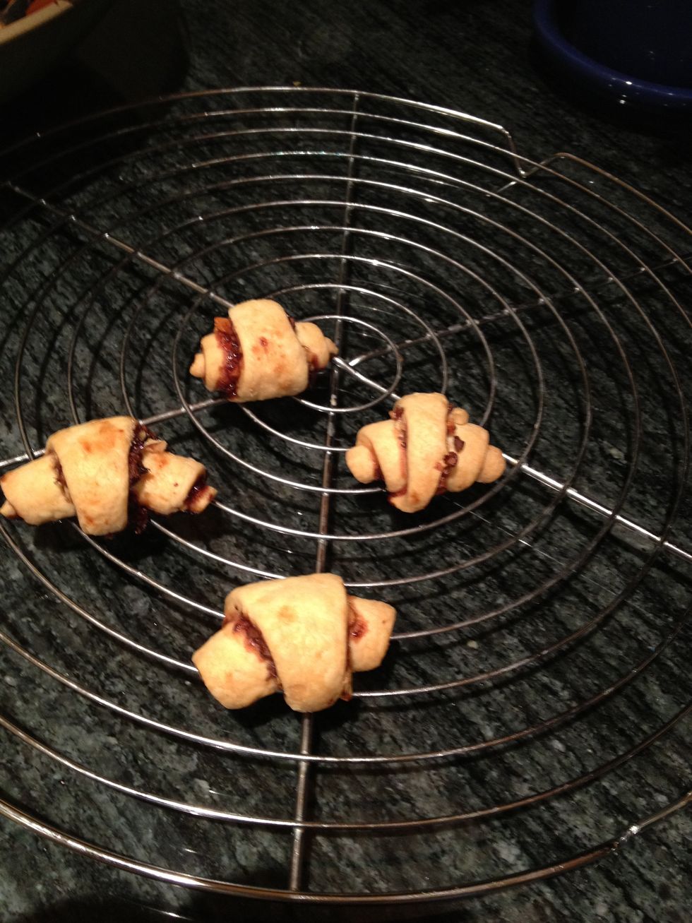 Bake at 375 on the center rack for about 40 minutes. The rugelach should be golden brown when done. Transfer to cooling rack. Can be made ahead and stored in an airtight container for up to a week.