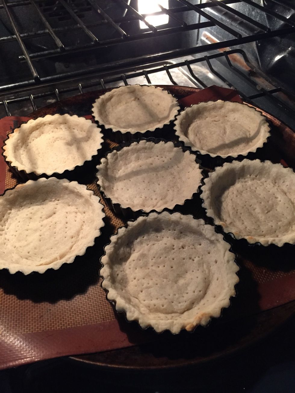 Bake at 425\u00b0 for about 15 minutes covered loosely with tin foil. If the middle bubbles up just gently push down with a paper towel or cloth