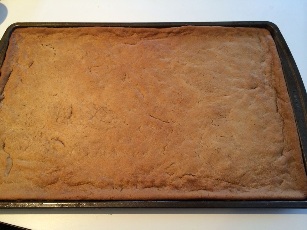 Bake dough according to your dough's directions (for us, 12 minutes at 350 degrees), then let cool.  Better to underbake than overbake!