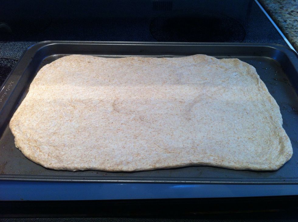 Bake dough for 5 minutes. This keeps the dough from getting soggy and remove from the oven to add toppings.