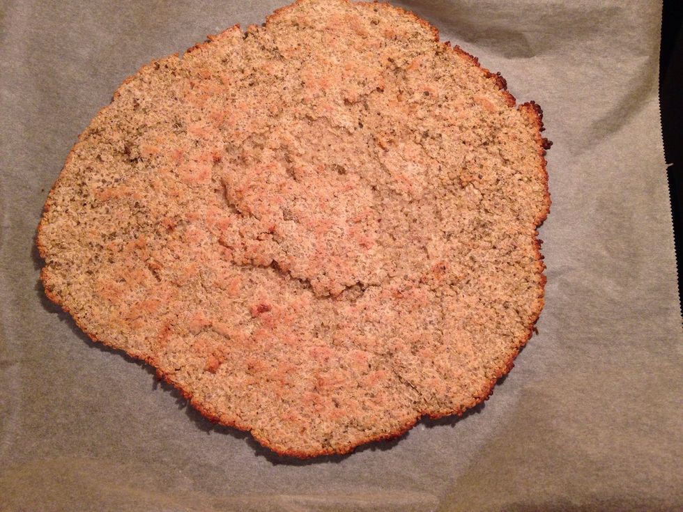 Bake for 10 minutes and flip it and bake it for another 10 minutes. Best way to flip it is by using another sheet of parchment paper. Place it on top and flip both together. Looks super crunchy now!