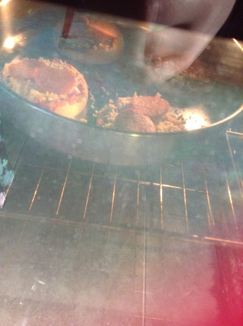 Bake for 10 minutes in the oven, or until the cheese is melted AND muffins are brown on the edges.