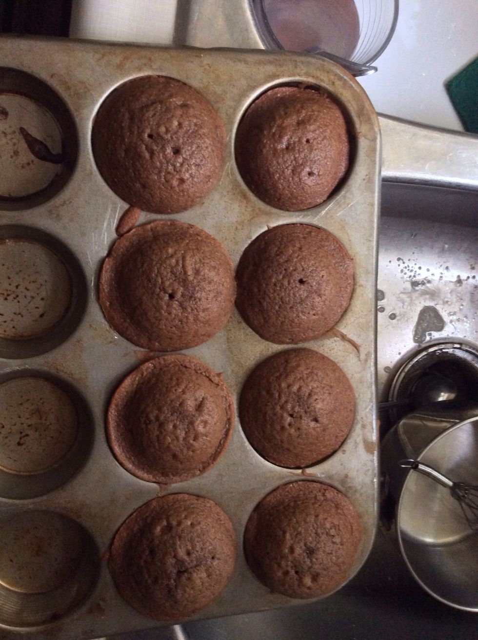 Bake for 12-15 minutes until muffins are cooked through to the middle. Remove from oven and let them cool a bit.
