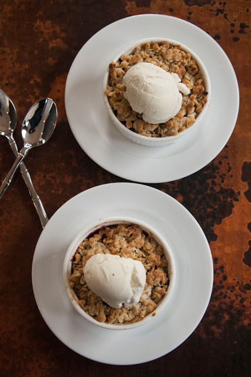 Bake for 25 minutes , or until the juices are bubbling and the top is golden. Let it cool for a bit before serving it up. You can top it with whipped cream, creme fraiche, or vanilla bean ice cream.