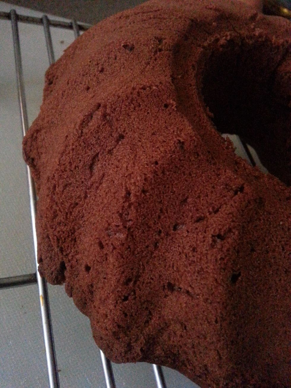 Bake for 40 minutes. Stand the cake in the pan for 5 minutes. Turn onto a wire rack over tray.