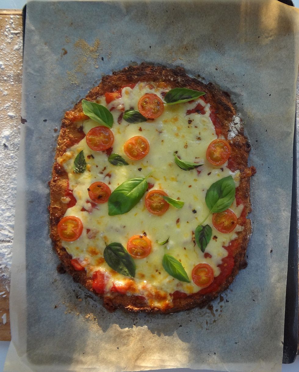 Bake for 5-10 more minutes, or until the cheese is bubbling and golden. Remove from oven. Scatter fresh basil leaves over the top.