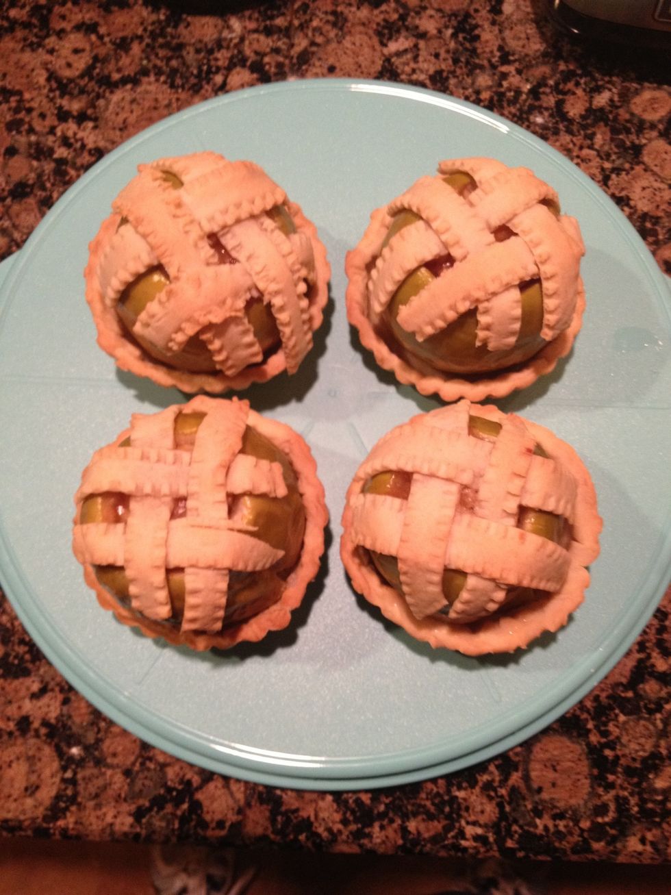 Bake in 350 degree Fahrenheit oven for 40-45 minutes, until apples are soft to touch. Remove and let cool slightly. Transfer to pie shells as soon as possible. Serve warm! Enjoy!!