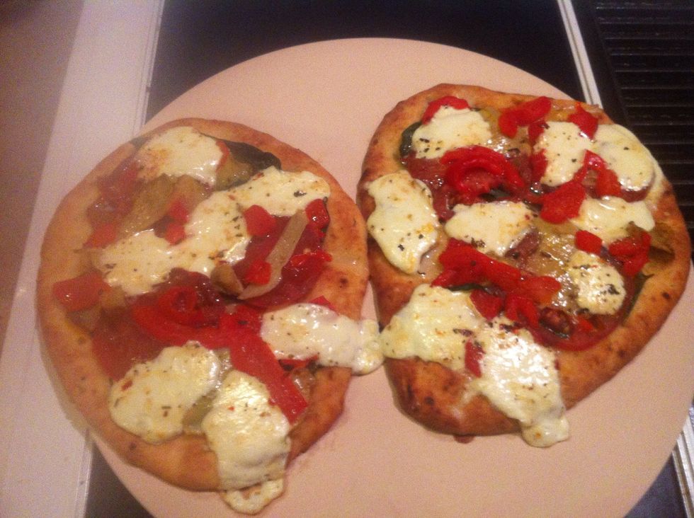 Bake in a 400 degree oven about 10 minutes. Sprinkle with cheese and fresh basil