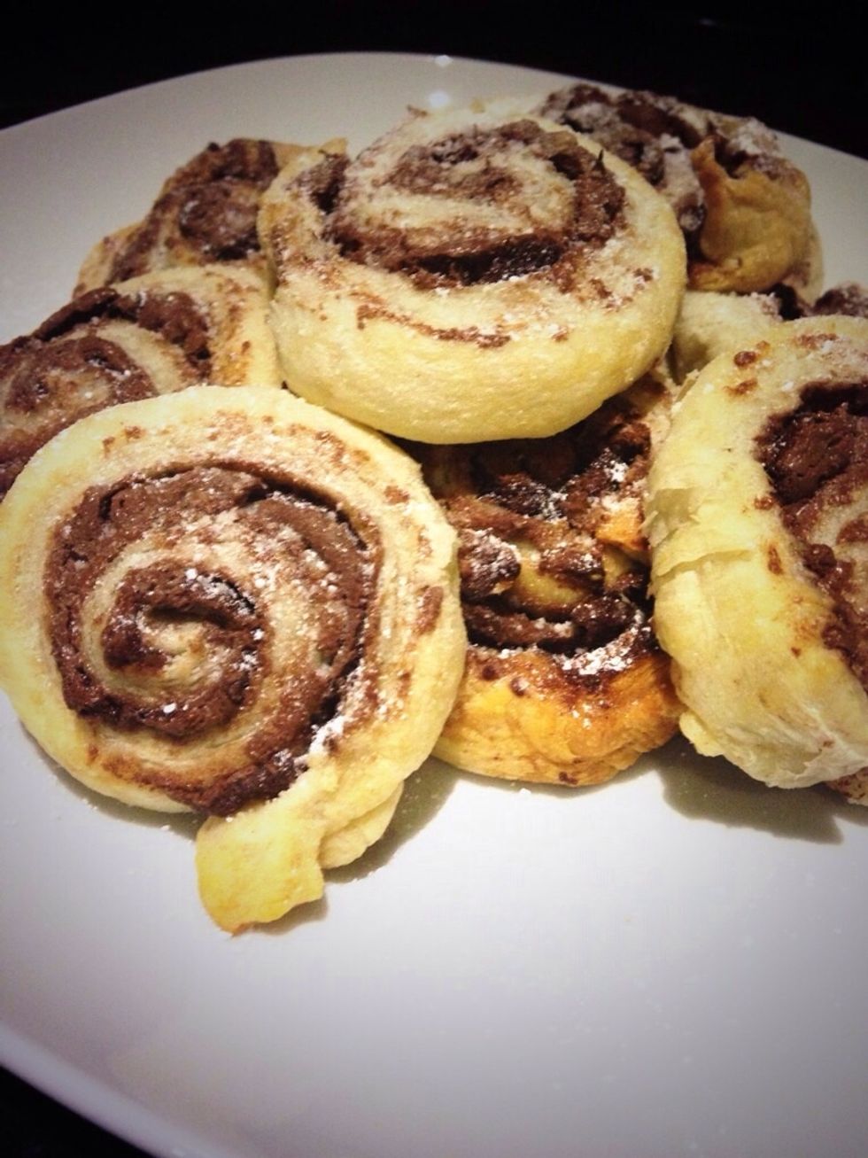 Bake in a preheated oven at 200 degrees for about 15mins until pastry has puffed up and golden. Cover with icing sugar. Yum!!