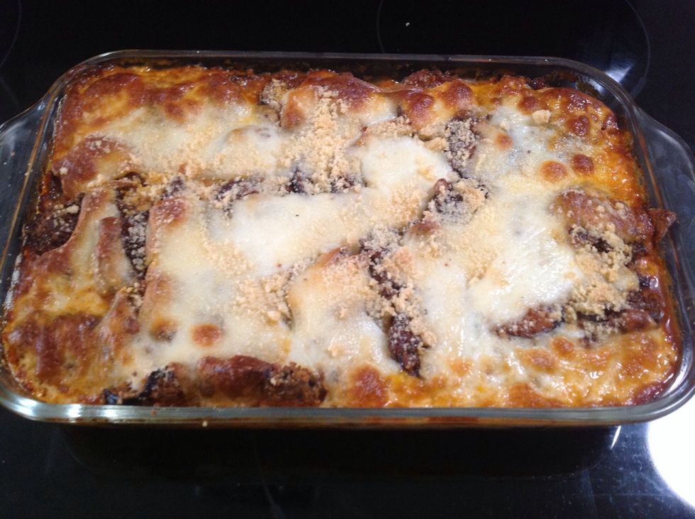 Bake in a preheated oven at 350 degrees for 35-40 minutes. Remove from oven and let sit for 10-15 minutes to make it easier to serve.