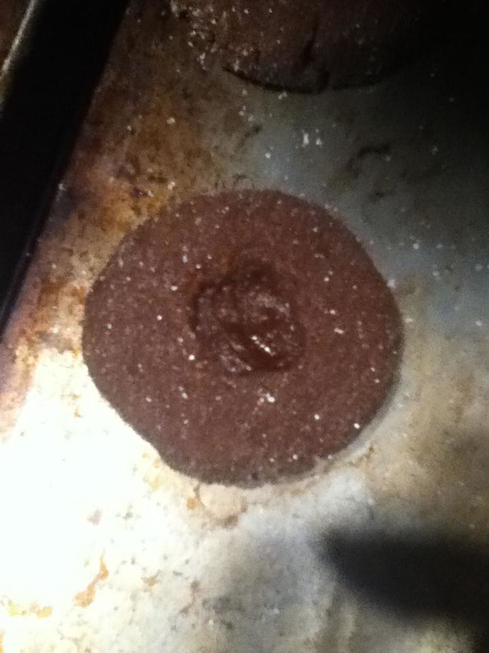 Bake in oven on 350 degrees for 5 minutes. When 5 minutes is up, use something round to make an indentation in the center. Bake for another 2 minutes.