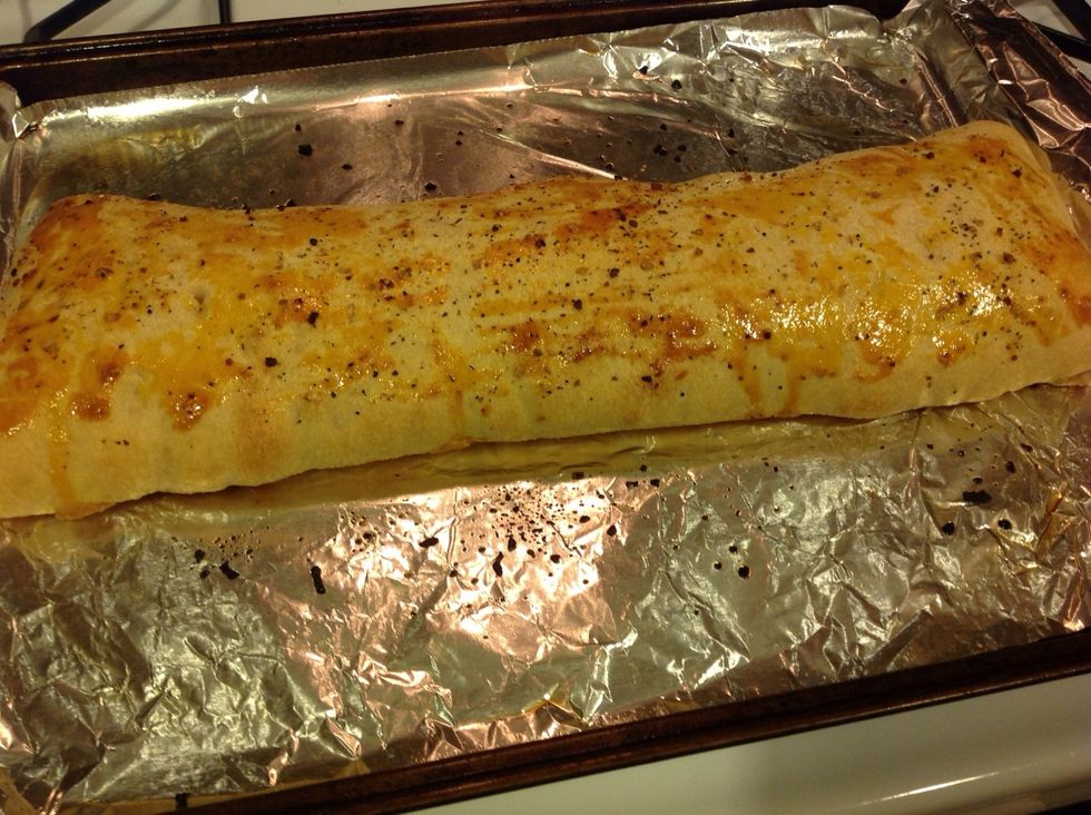 Bake in preheated 350 degree oven for 25-30 minutes, or until top is golden brown. Wait five minutes before slicing.