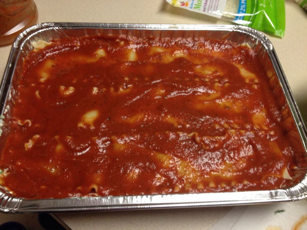 Bake in the oven until bubbly (about 1.5 hours) and add mozzarella cheese on top for the last five minutes of baking.  Once out of the oven, let sit for at least 15 minutes before cutting