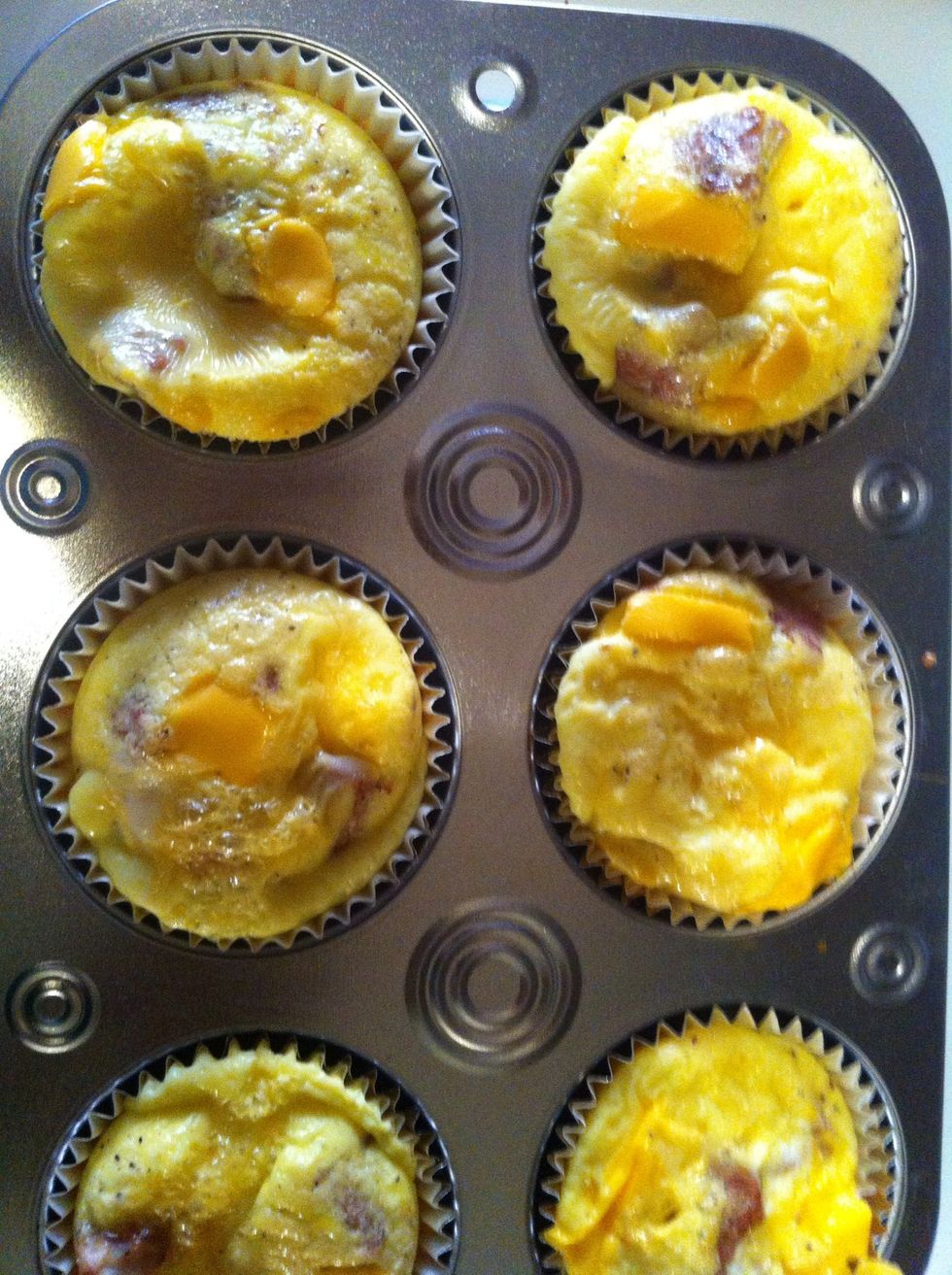 Bake on 400 for 13-15 minutes. Use a toothpick just like with cupcakes, to see if the omelets are done. (It's not pretty, but it's pretty tasty) :)