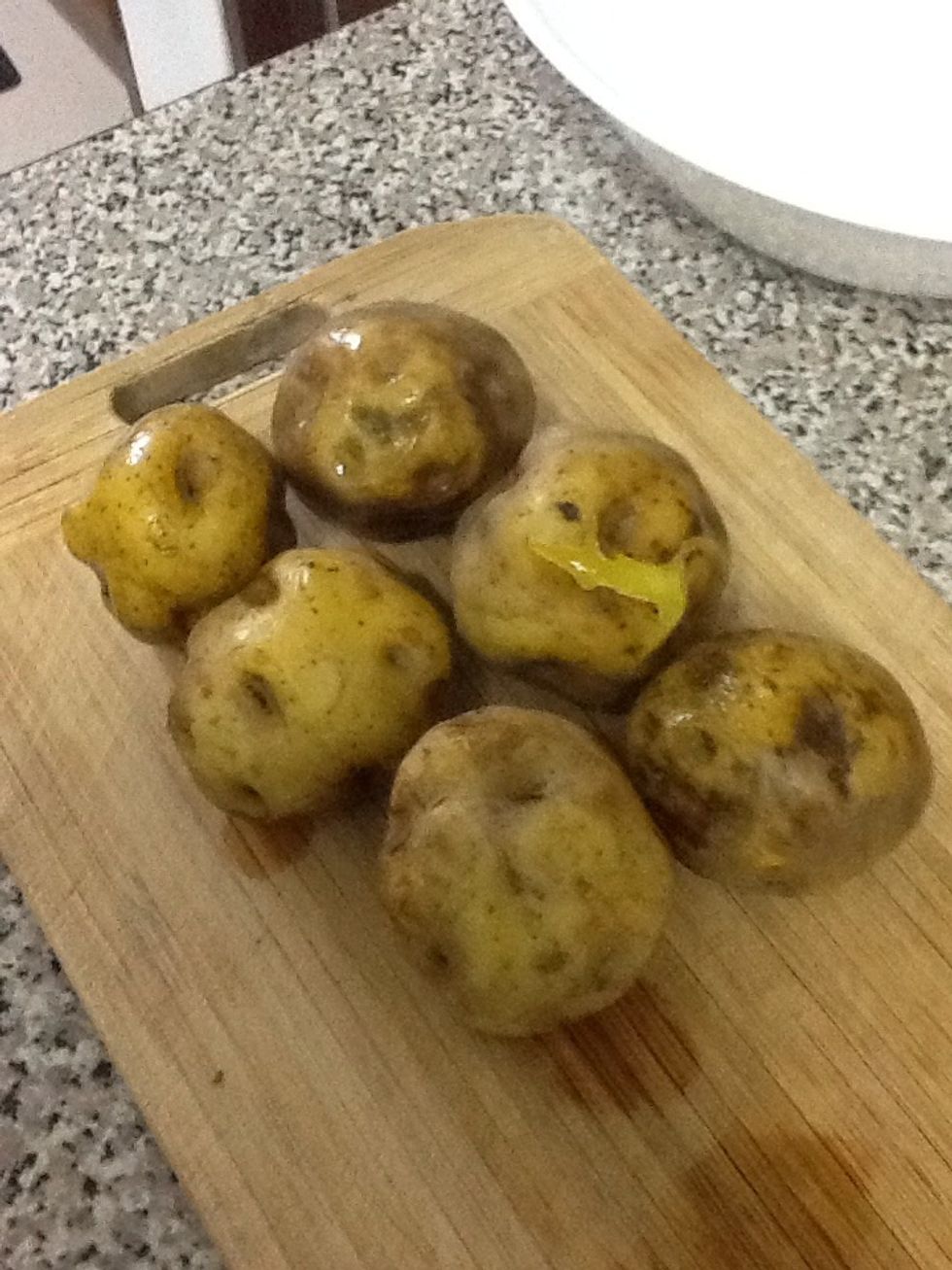 Bake some potatoes. These are Peruvian yellow potatoes, but the dish can be made with other potatoes with an equally starchy texture.