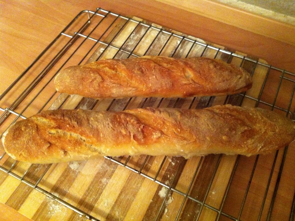 Bake the baguettes for 25 - 30 minutes until the crust is golden brown. Take them out and let them cool on a rack.