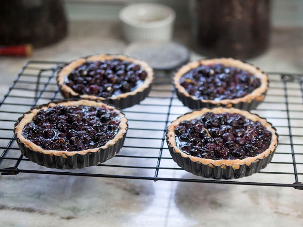 Bake them for about 20 to 30 minutes. You'll know when they're done when the crust begins to turn firm and golden. Take them out and slide them onto a cooling rack.