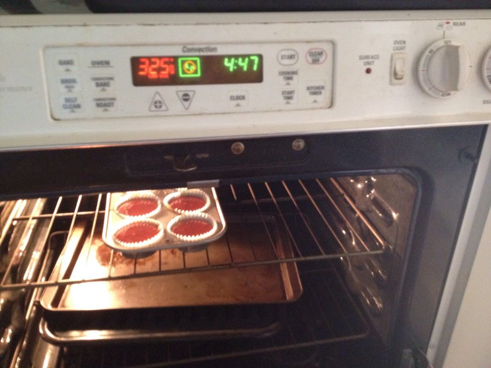 Bake! while baking do something to help pass the time Just don't forget that you have yummy cupcakes baking!!