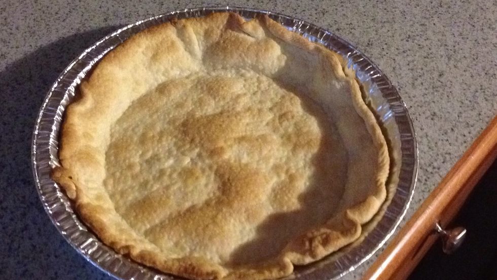 Bake your crust until light brown color is reached. When done turn your oven down to 350 degrees.